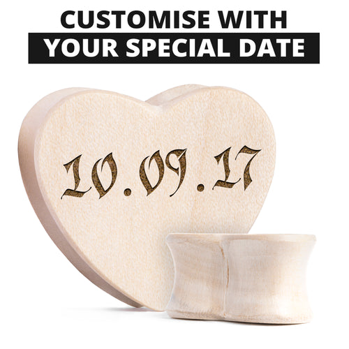 Einfügen von verzierten herzförmigen Krokodilholz- Plugs/Messgeräten