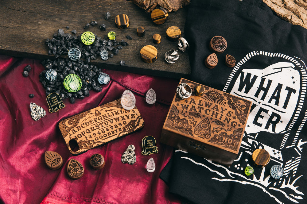 Custom Plugs CONJURED SPIRITS range being showcased on a wooden background