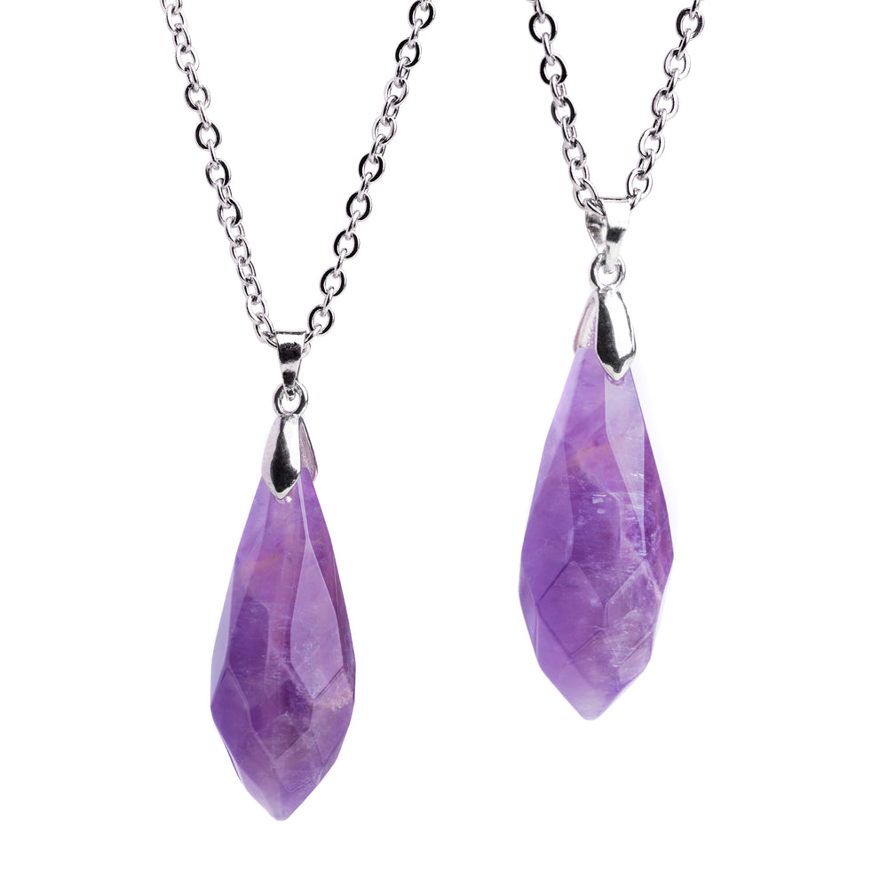Two Silver & Amethyst Wand Necklaces with pendants, one standing upright and the other lying horizontally, displayed on a white background.