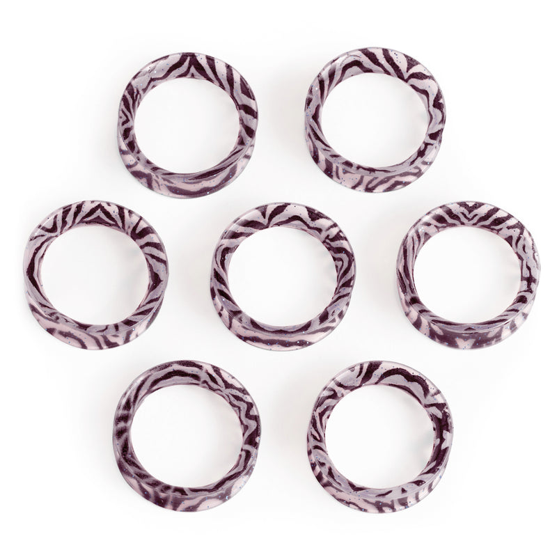 Tunnel d'oreille en silicone à œillet zèbre pailleté