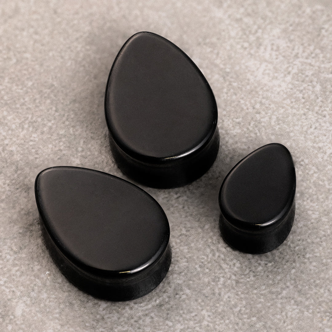 Schwarzer Tropfenförmiger Glas Plug / Dehnung