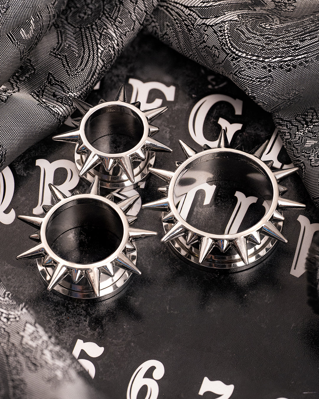 Spiked Screwback Stainless Steel Ear Tunnel