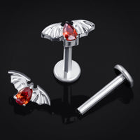 Labret en titane fileté interne, chauve-souris sertie de strass rouges, argenté, calibre 1.2mm