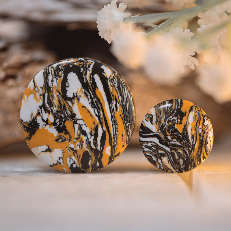Plug d’oreille en pierre marbrée orange et noire / gauge