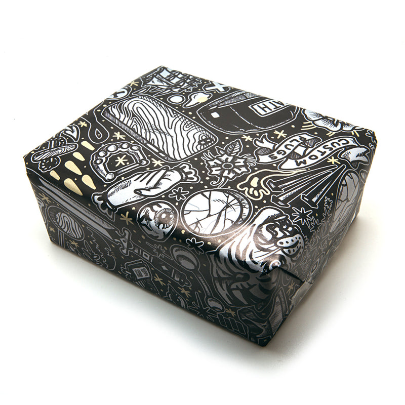 Papier cadeau motif explosion Plug