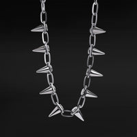 Collier ras-du-cou chaîne à pointes argentée