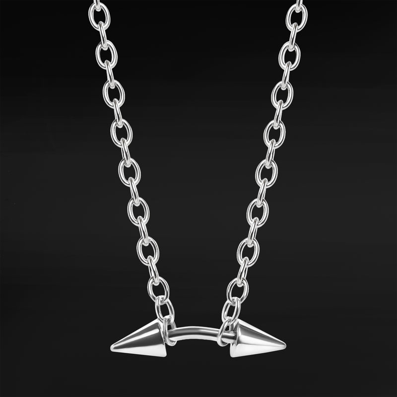 Collier ras-du-cou chaîne avec barre courbée à grosses pointes en acier argenté