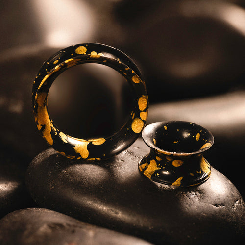 Splatter Black & Gold Eyelet Silicone Ear Tunnel