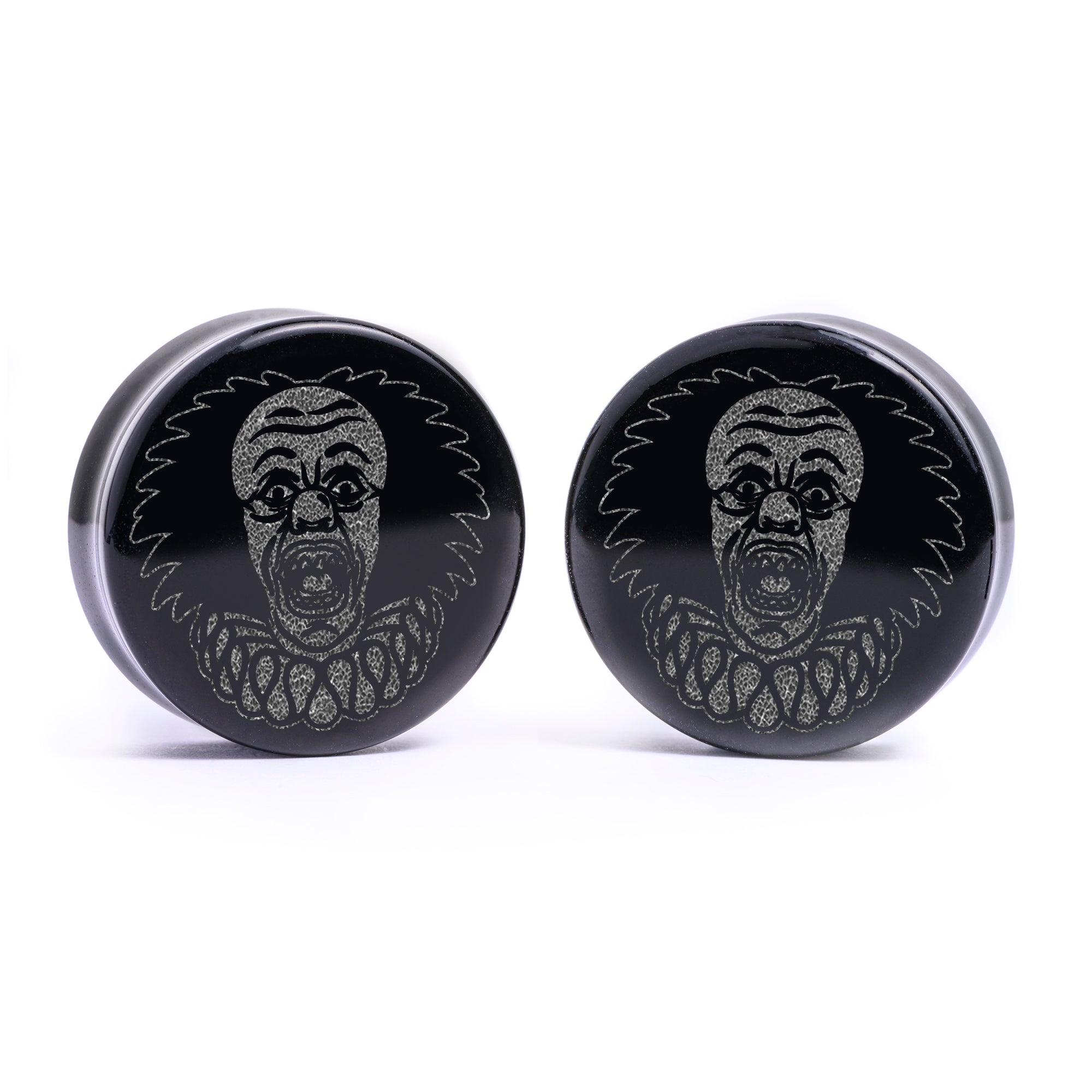 Woman wearing awesome demon face acrylic inlay and wood plugs / gauges