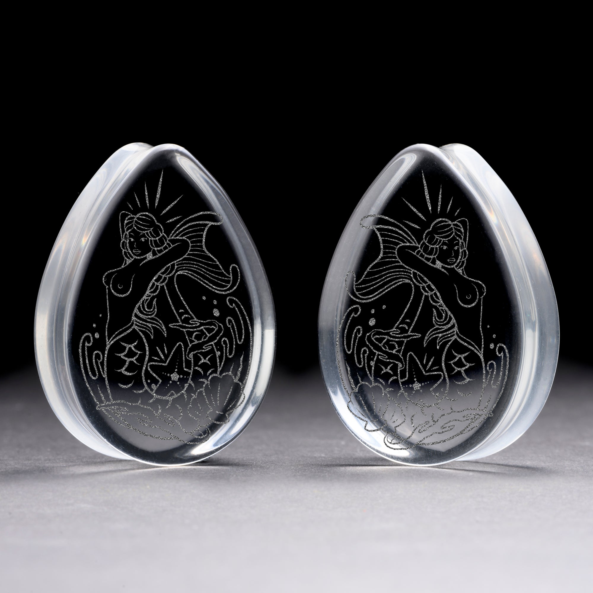 Alternative Tattooed man wearing custom made Sacrificial Lamb Plug / Gauge - Saba Wood | Flat Faced Double Flare