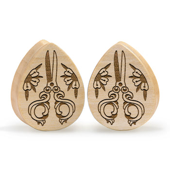 Guy wearing cool Brown Saba Wood Teardrop Wood Ear Plug / Gauge