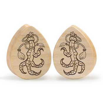 Guy wearing cool Brown Saba Wood Teardrop Wood Ear Plug / Gauge