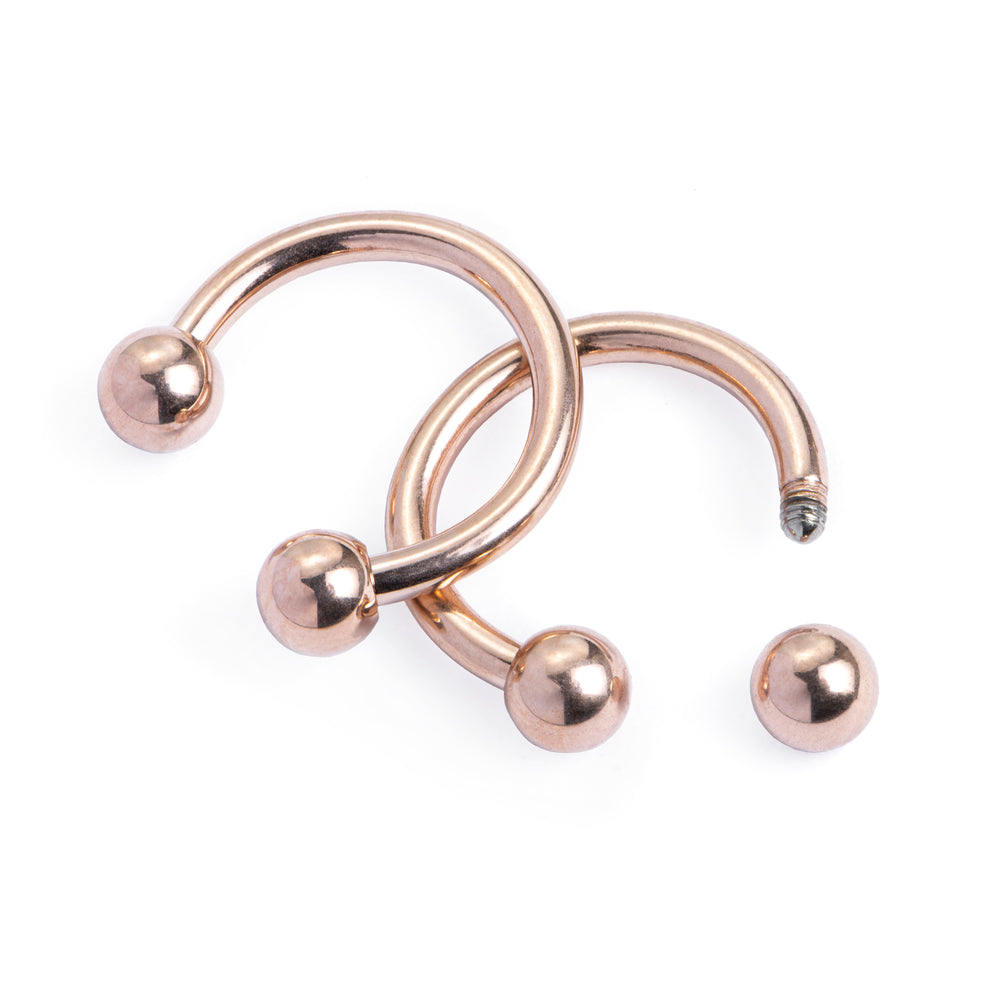 Rose gold deals circular barbell