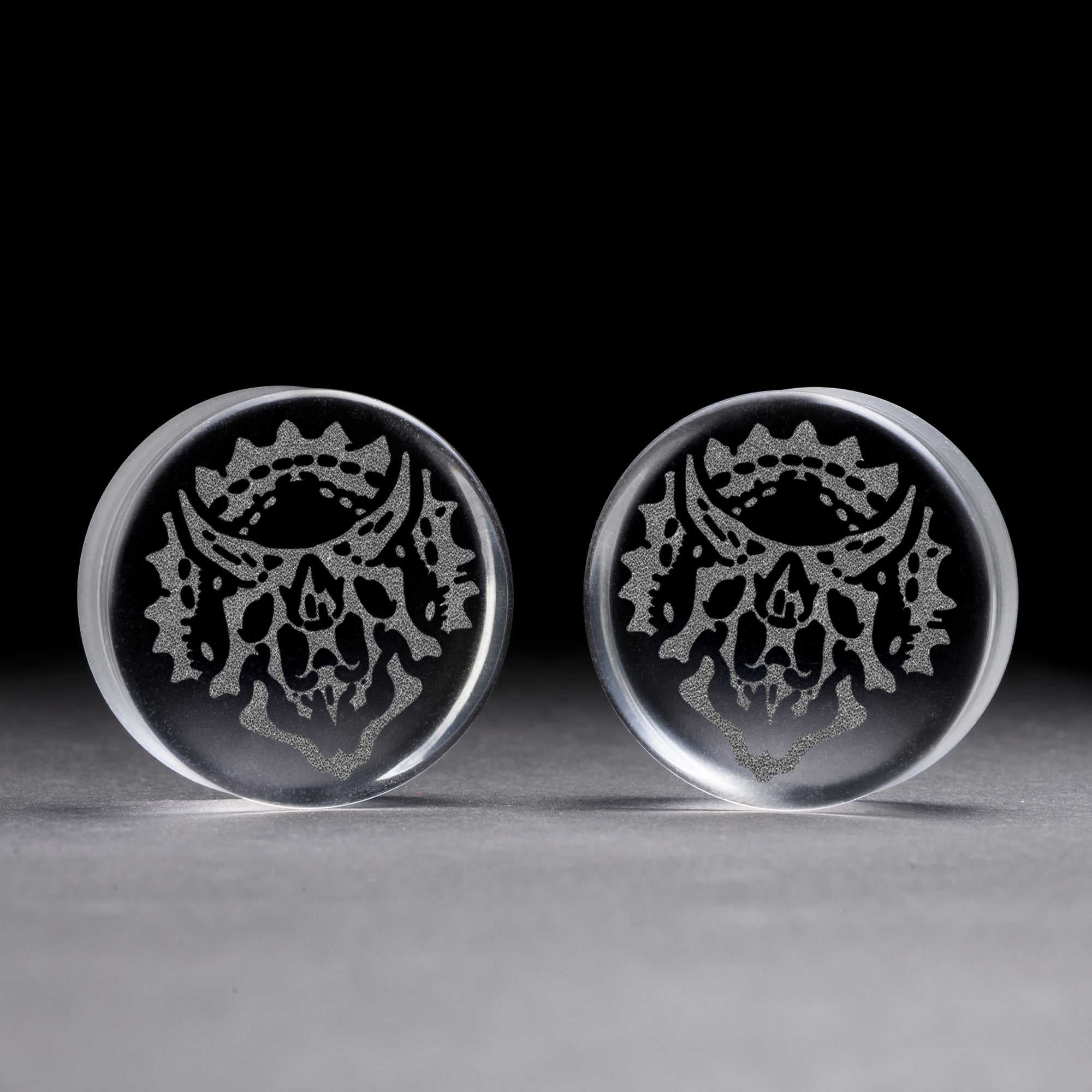 Alternative Tattooed man wearing custom made Sacrificial Lamb Plug / Gauge - Saba Wood | Flat Faced Double Flare